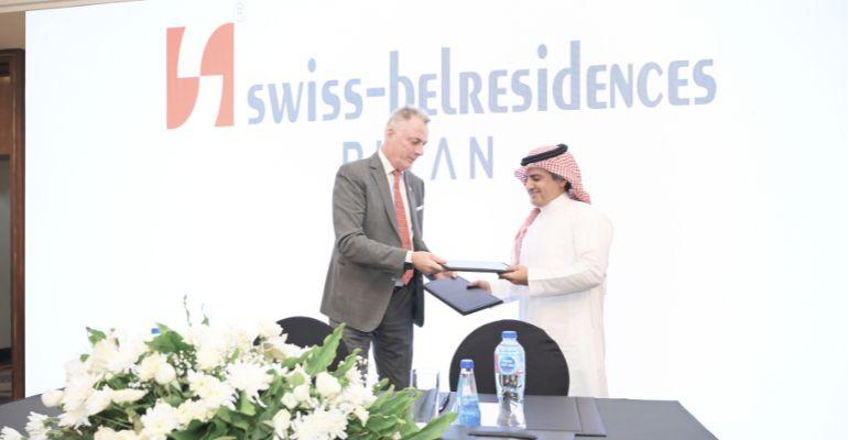 Eng. Salem Al Sudais Al Tameer Al Arabia with Laurent Voivenel for Swiss Belhotel International project agreementt.jpg