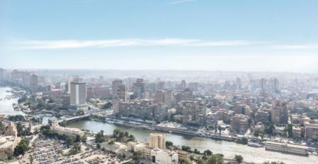 Downtown of Cairo on the bank of Nile river during the middle of a sunny day with blue sky, Egypt.jpg